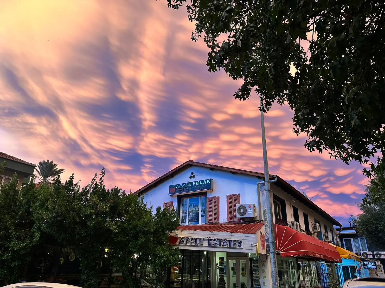Apple Estates office on Çarşı Caddesi in central Fethiye at sunset